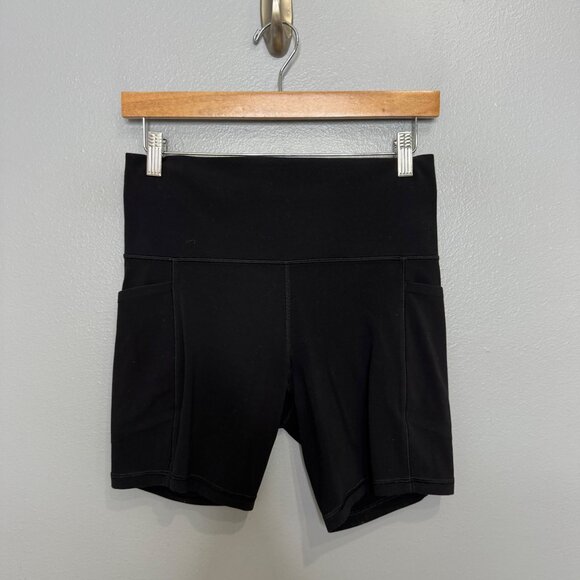 ATHLETA salutation stash pocket II 7" shorts in black size M - Picture 2 of 7